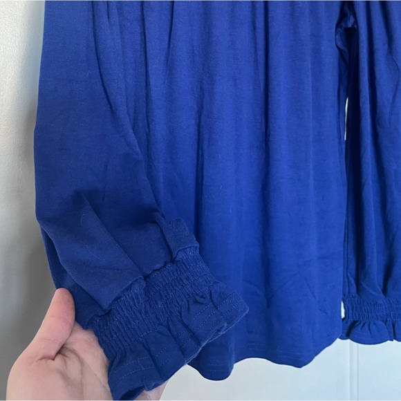 Blue long sleeved shirt with ruffled sleeves. Size Large. Never worn, gifted. - Picture 2 of 3